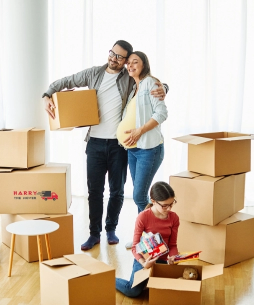 Happy family packing boxes with Harry The Mover for best interstate move from Melbourne. Happy family packing boxes with Harry The Mover for best interstate move from Melbourne.