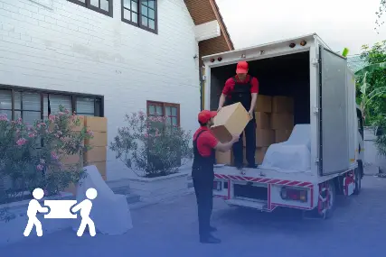 Removalists from Harry The Mover loading furniture and moving boxes into secure storage truck, providing safe temporary storage and relocation services across Melbourne.