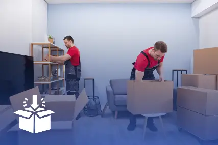 Professional movers from Harry The Mover carefully packing and unpacking household furniture and moving boxes during organised home relocation service in Melbourne.