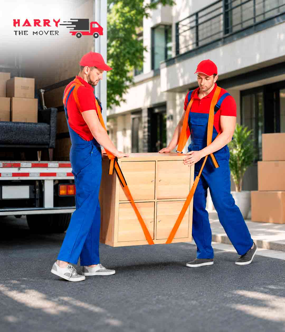 Two professional movers from Harry The Mover carrying heavy furniture during residential relocation service, showcasing why they are recognised among the best movers Melbourne for trusted house moving and furniture removal solutions.