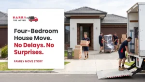 Blog 2 Removalists carrying boxes and wrapped furniture from a four-bedroom Melbourne home to a moving truck.